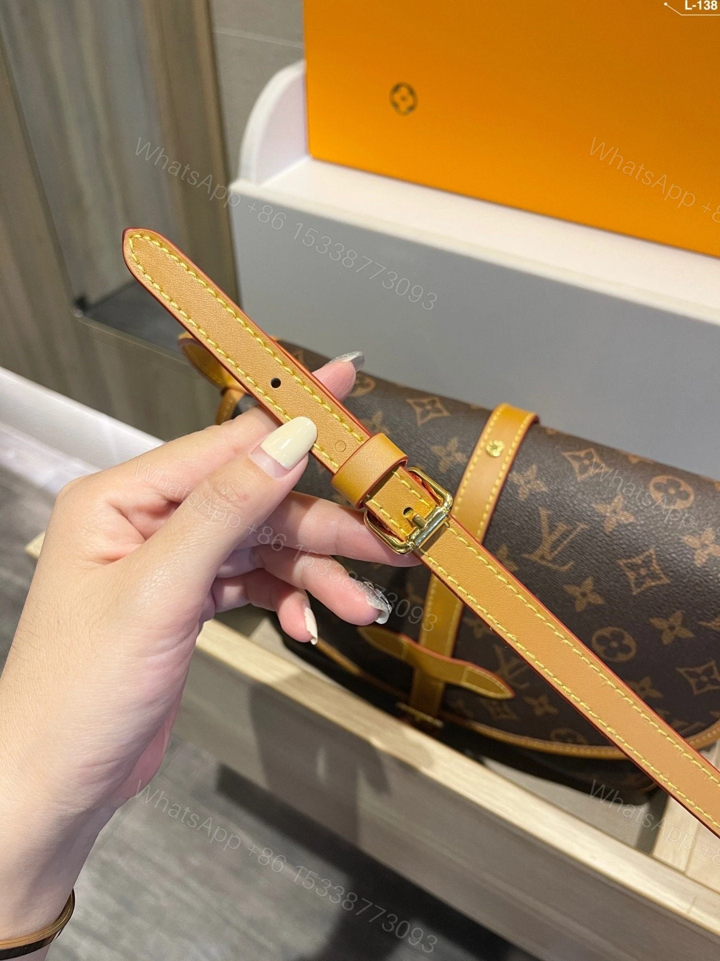 View 9 of Louis Vuitton Monogram Saumur 30