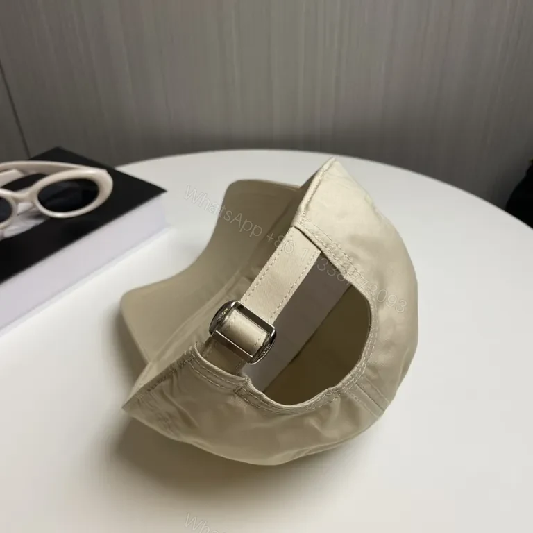 View 8 of Chic Beige Celine Logo Cap â€“ Premium Minimalist Style