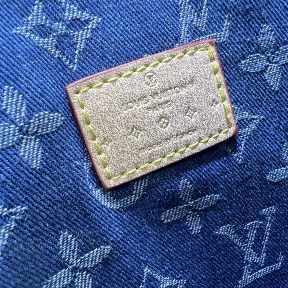 View 9 of Louis Vuitton Alma Backpack Blue Denim 20Cm