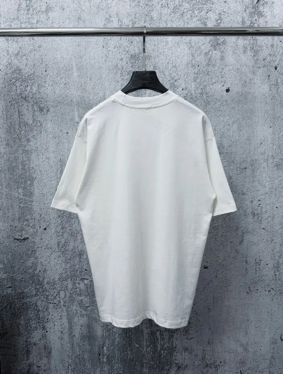 View 4 of Minimalist Logo Tee: Modern Edge, All-Day Comfort, Oversized