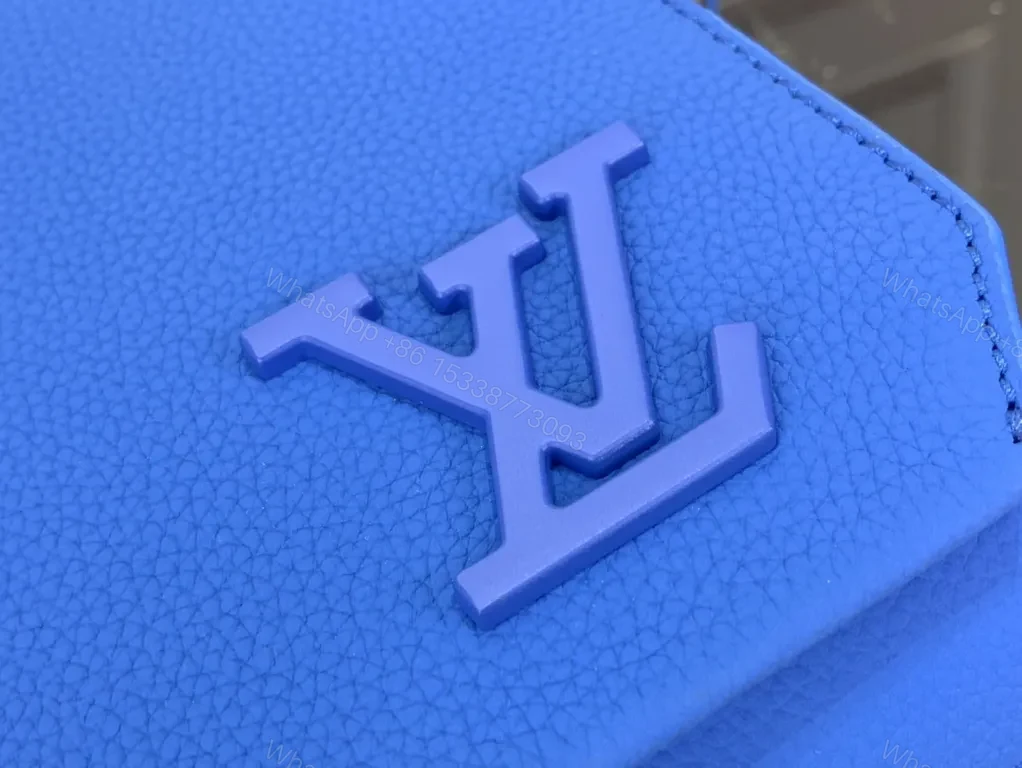 View 9 of Bold Blue Crossbody: Textured Leather, LV-inspired Monogram Bag
