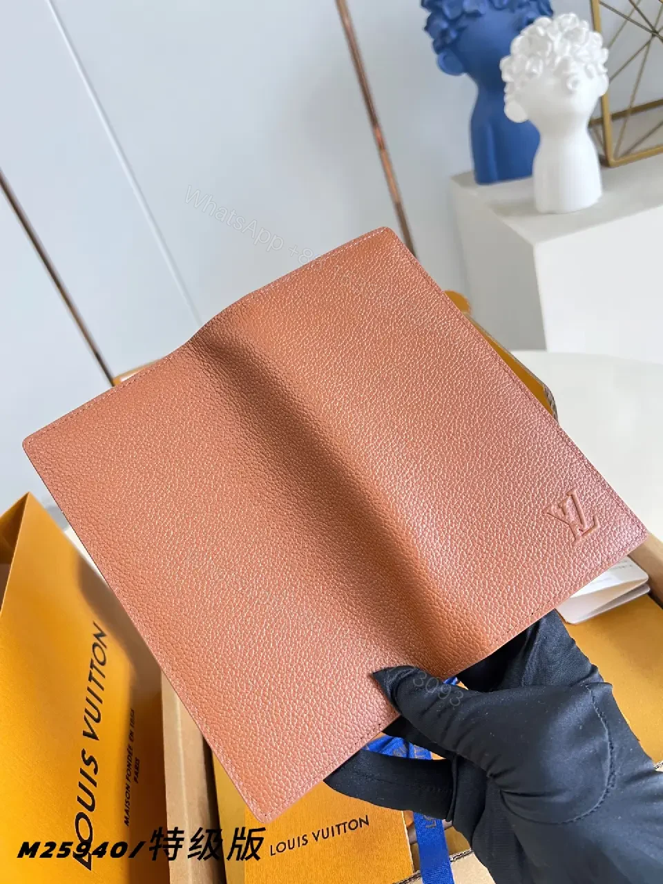 View 7 of Light Brown/Pale Pink Pebbled Leather Bi-Fold Wallet with LV Embossed Logo