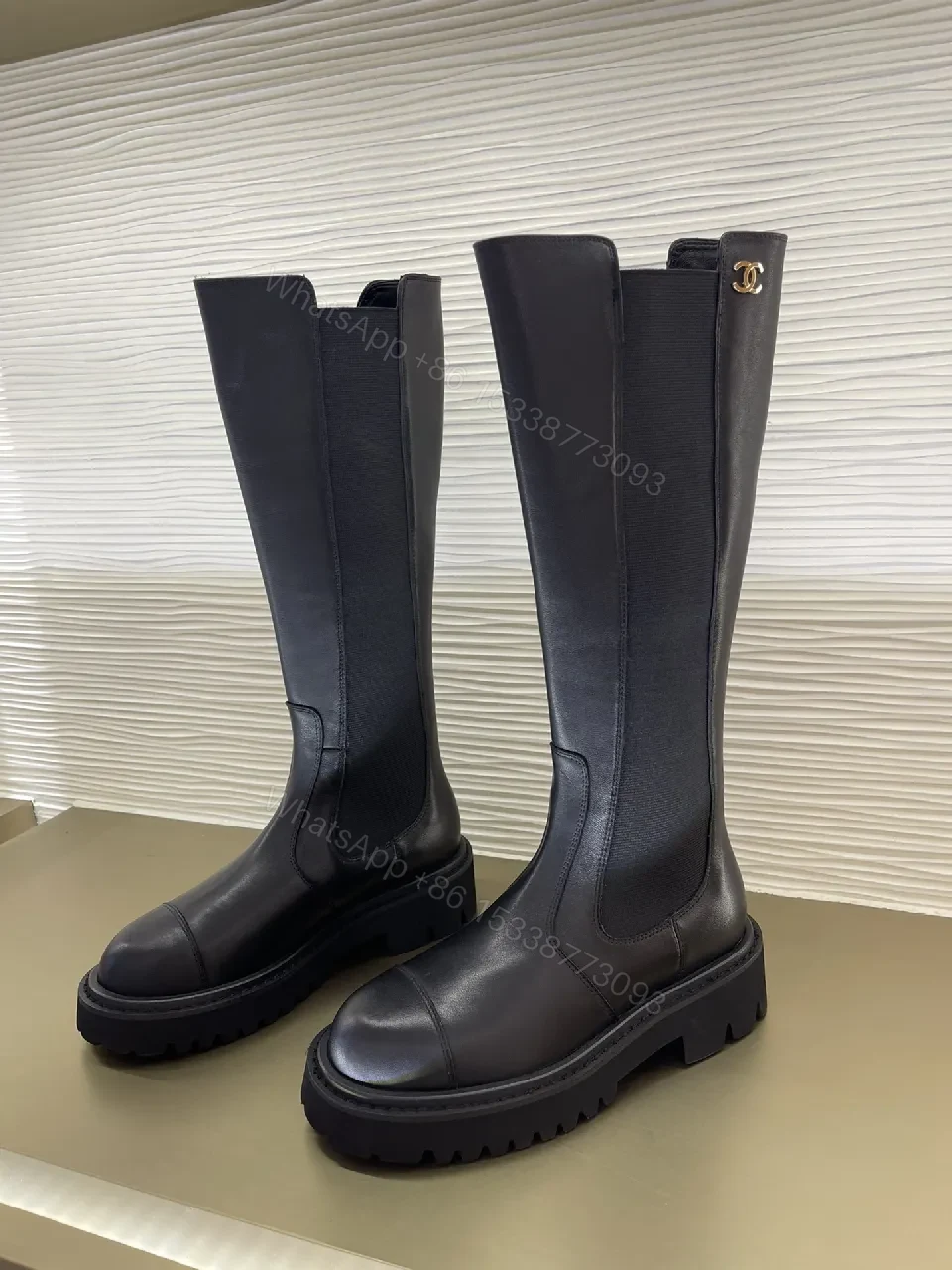 View 3 of Chic Knee-High Boots with Signature Hardware Leather-Luxe Style