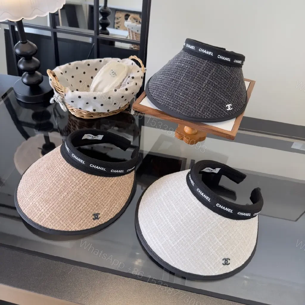 View 3 of Dark Gray Tweed Visor Cap with White Chanel Logo and Silver Emblem