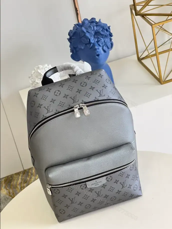 View 7 of LOUIS VUITTON DISCOVERY BACKPACK PM TAIGARAMA – LBV387