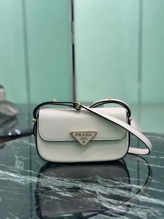 Elegant Leather Crossbody Bag: Prada Triangle, Structured Luxury — view 1