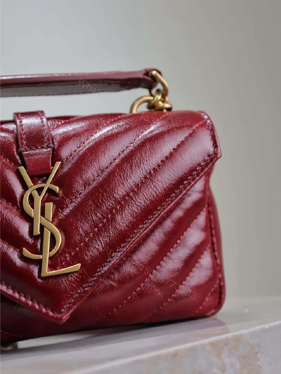View 3 of Burgundy Quilted Crossbody Bag: Gold Hardware, Structured Style
