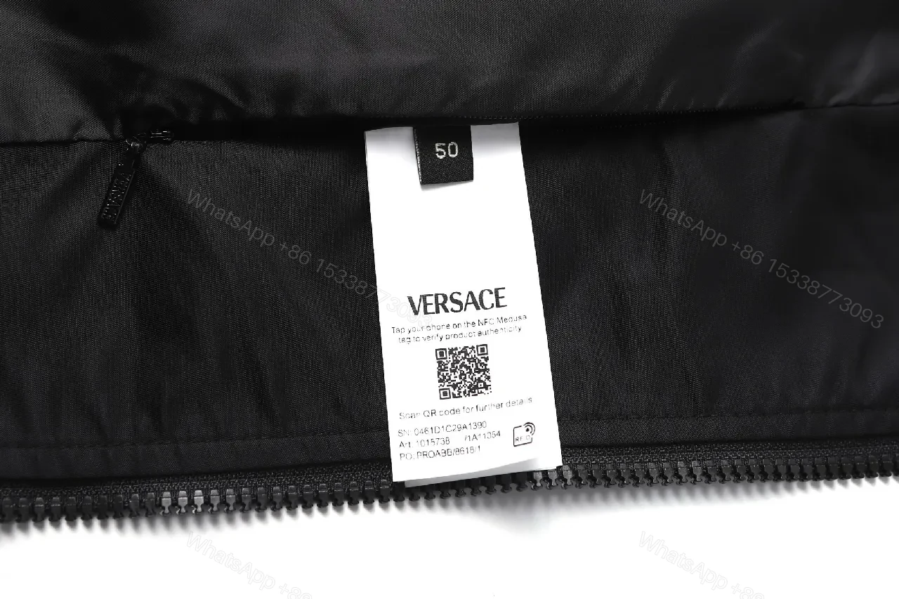 View 2 of Minimalist Black Bomber with Gold Accent: Modern Luxury Outerwear
