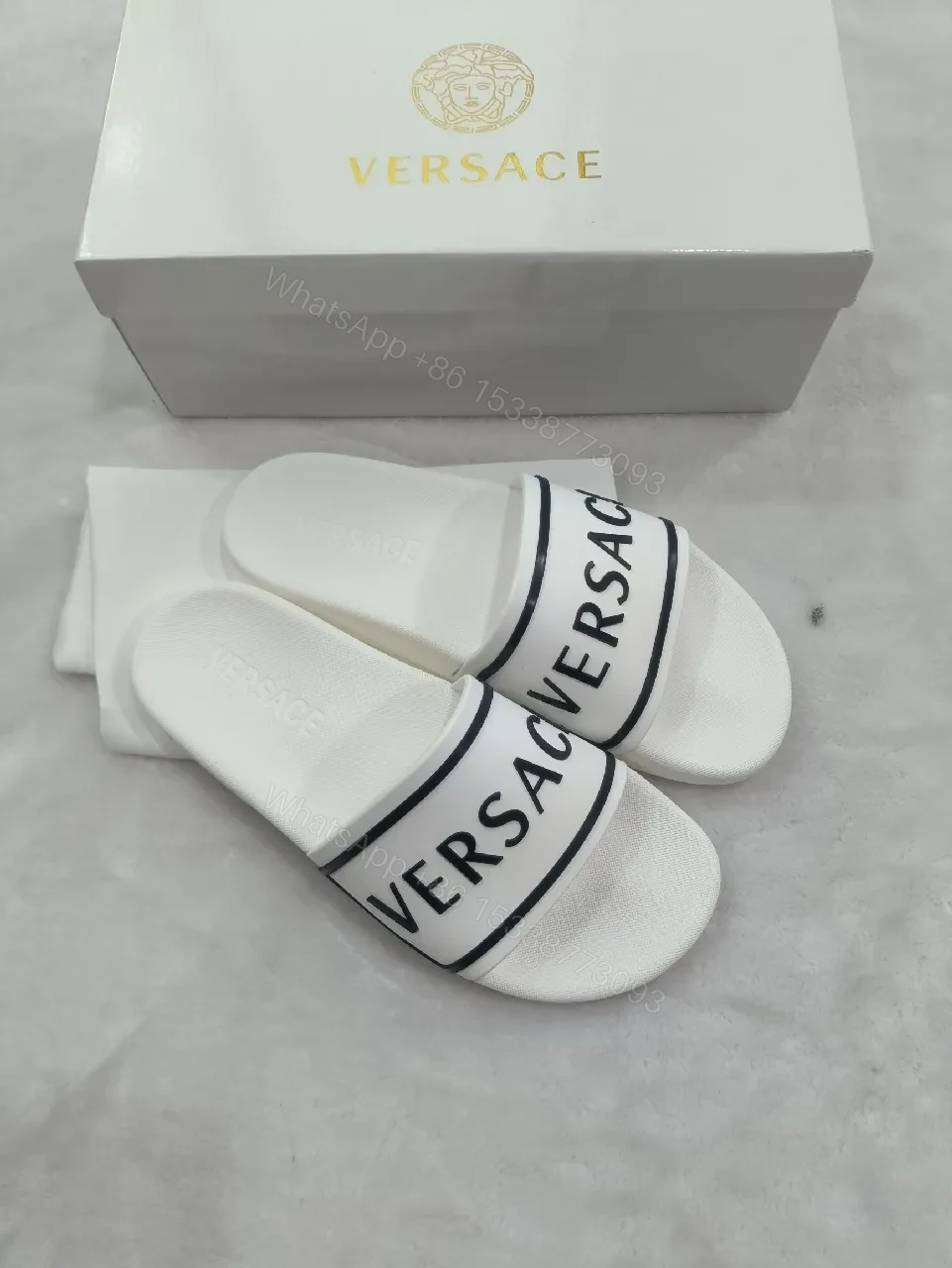White Leather Slide with Bold Brand Stripe, Unisex Comfort — view 1