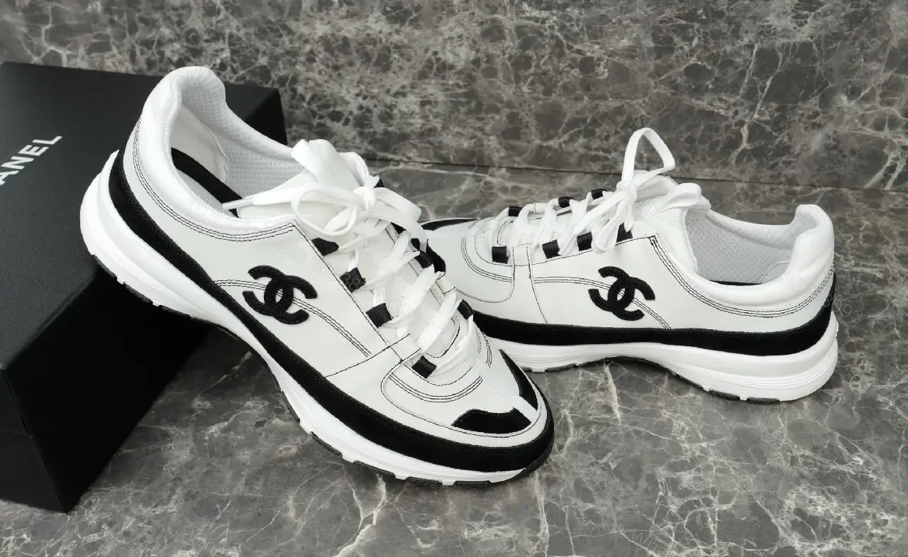 View 8 of White Leather Chunky Sneaker with Chanel Logo Details