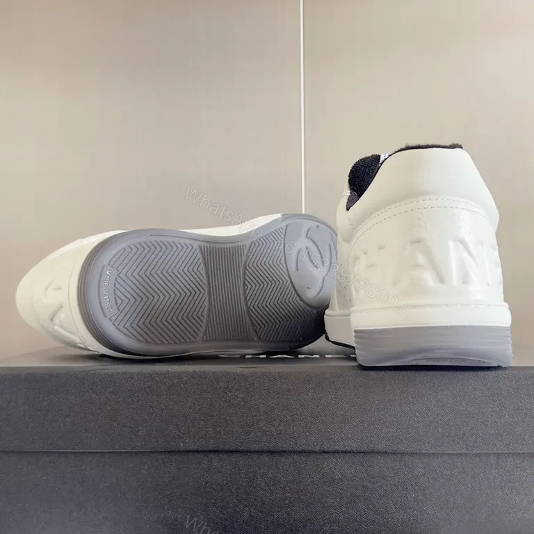 View 2 of Clean White Chanel-Inspired Court Sneakers with Bold Black Laces