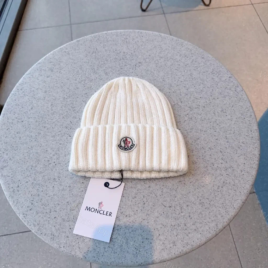 View 5 of Cozy Knit Beanie: Soft Ribbed Warmth, Subtle Emblem, Luxury Style