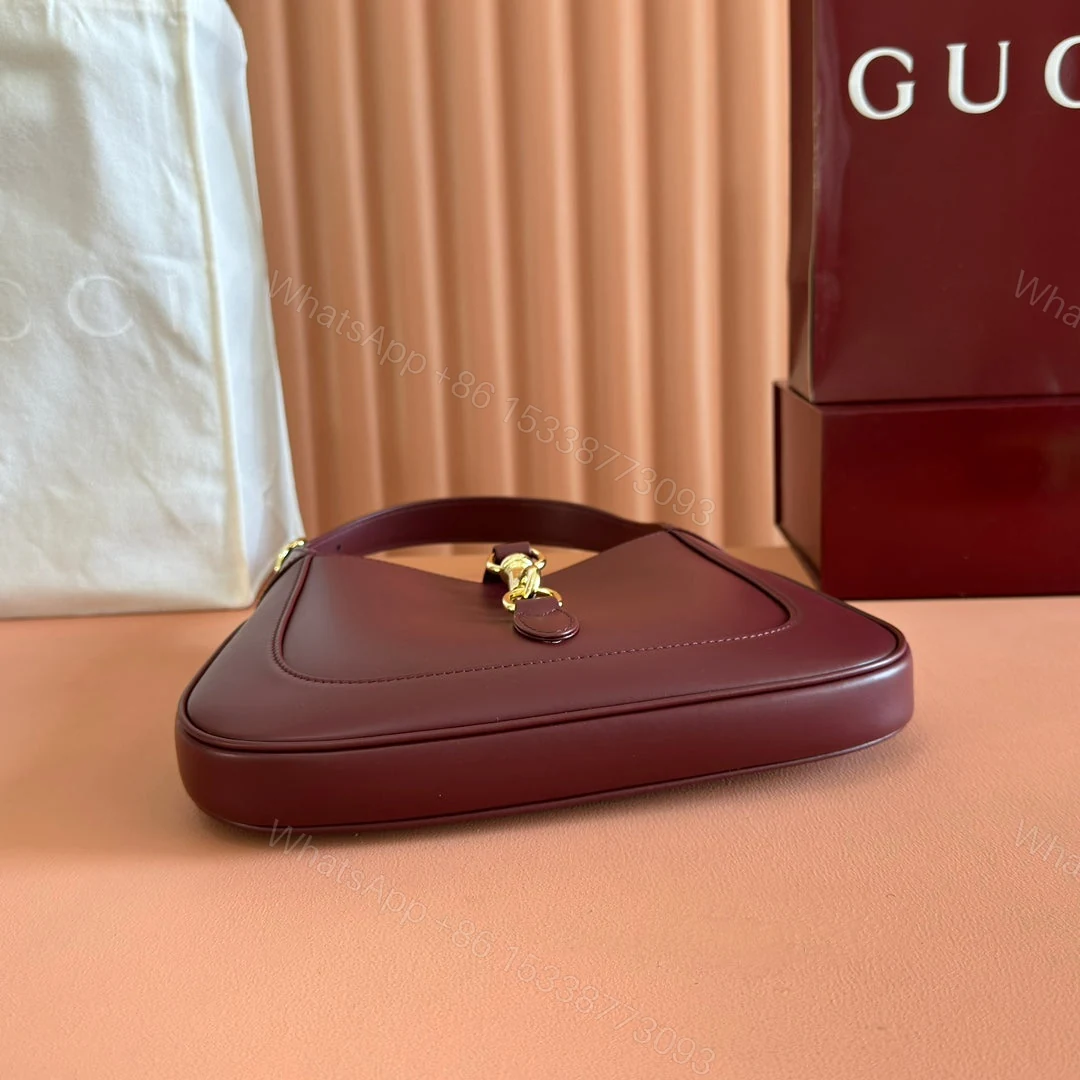 View 4 of JACKIE SMALL SHOULDER BAG 27 IN BURGUNDY RED CALFSKIN GOLD HARDWARE