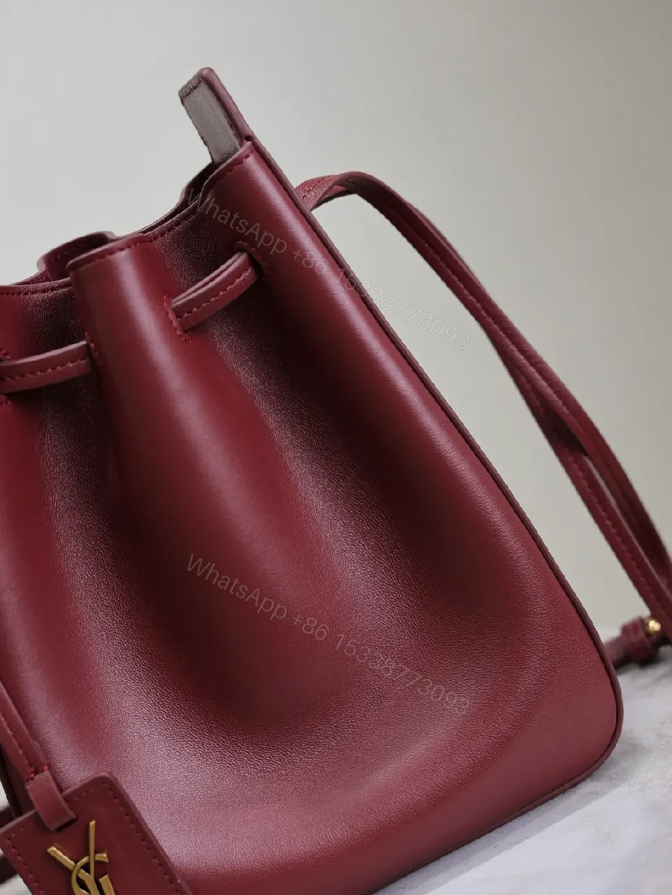 View 5 of Deep Bordeaux Leather Drawstring Bucket Bag—Elevated Everyday Style