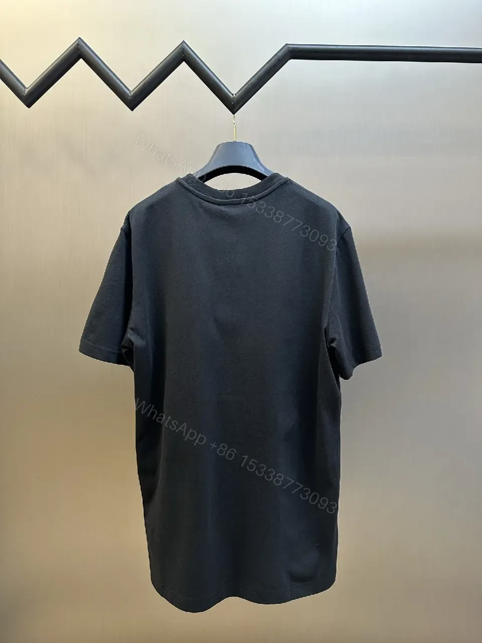 View 2 of Relaxed Luxury Patch Tee - Cotton Blend, Subtle Branding, Casual/Smart-casual