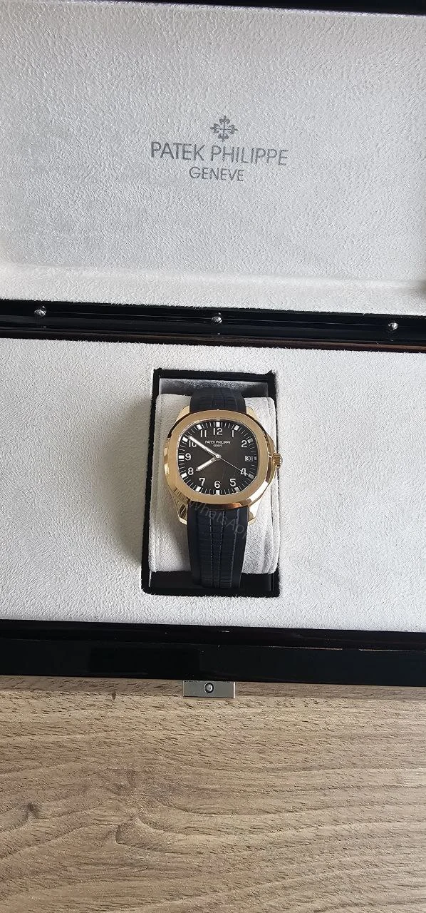 View 2 of Patek Philippe Aquanaut Rose gold with box and papers