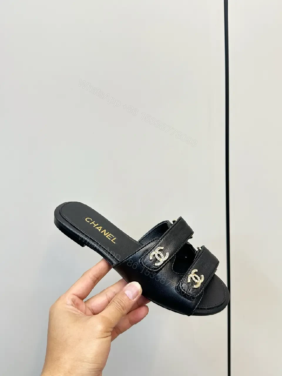 View 8 of Black Leather Slip-On Sandals with Gold Hardware - Sophisticated Everyday Glam