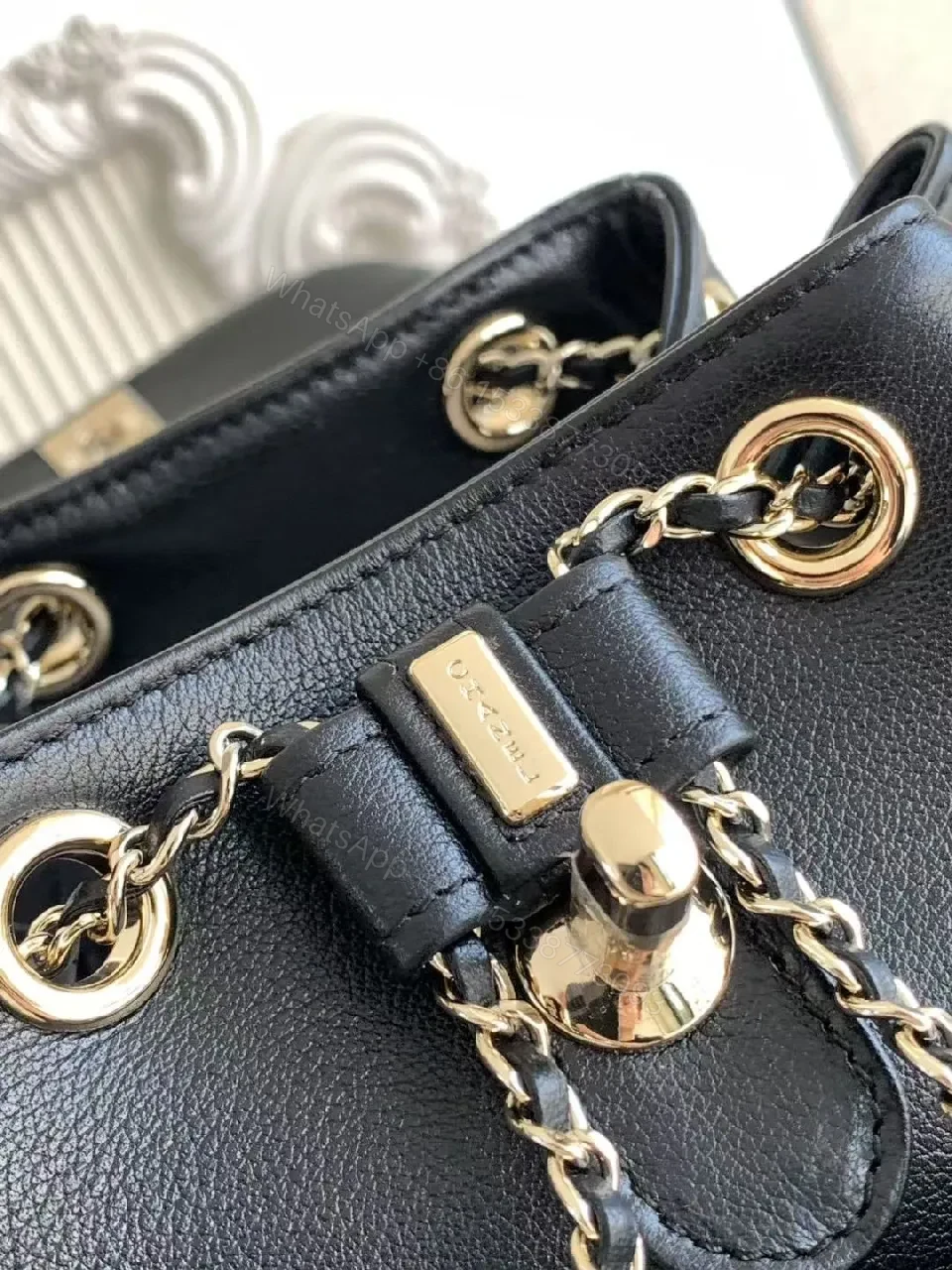 View 4 of Quilted Black Backpack with Gold Hardware Luxury Mini Bag