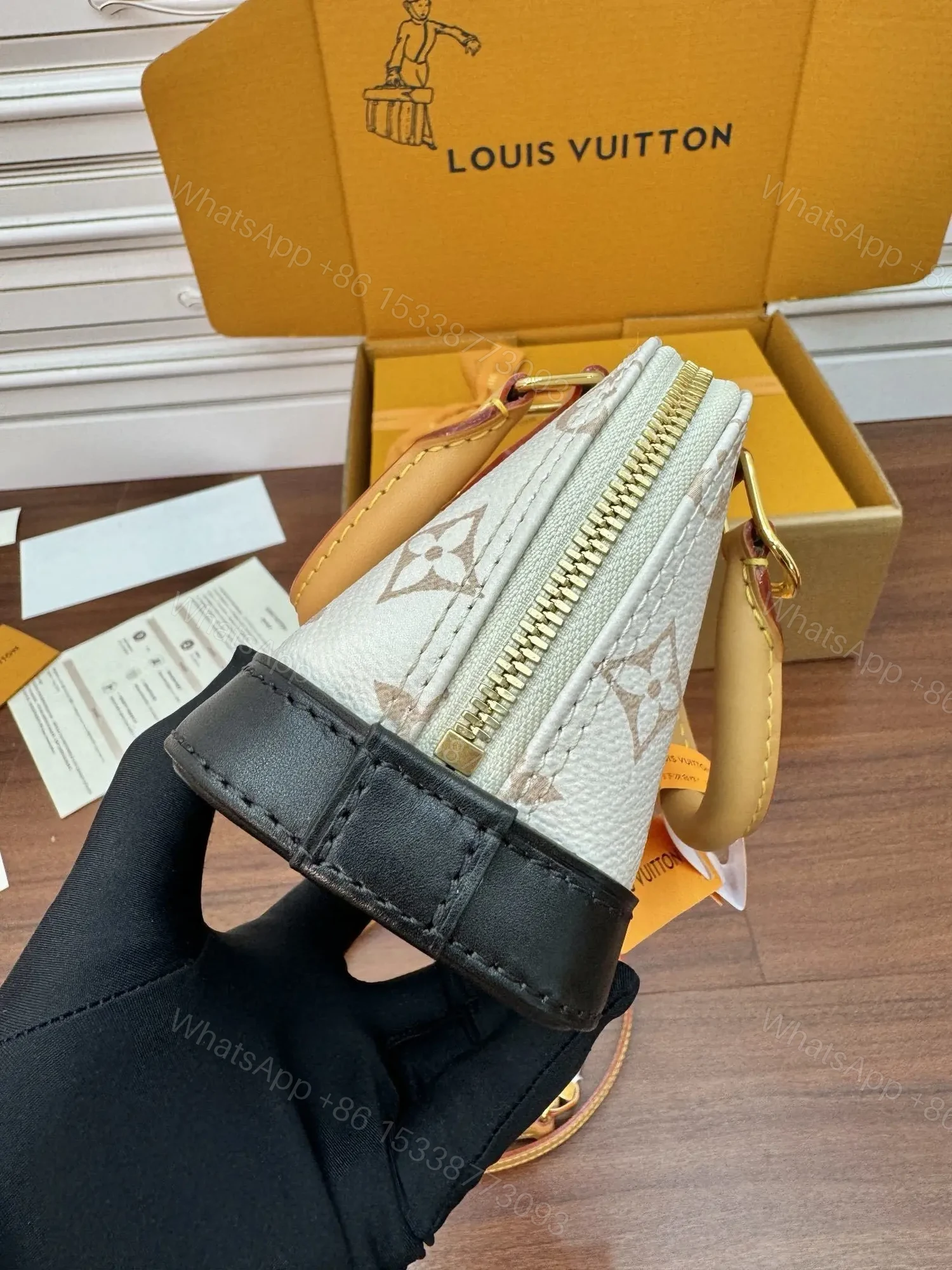 View 5 of Louis Vuitton Nano Alma handbag in Monogram Dune canvas