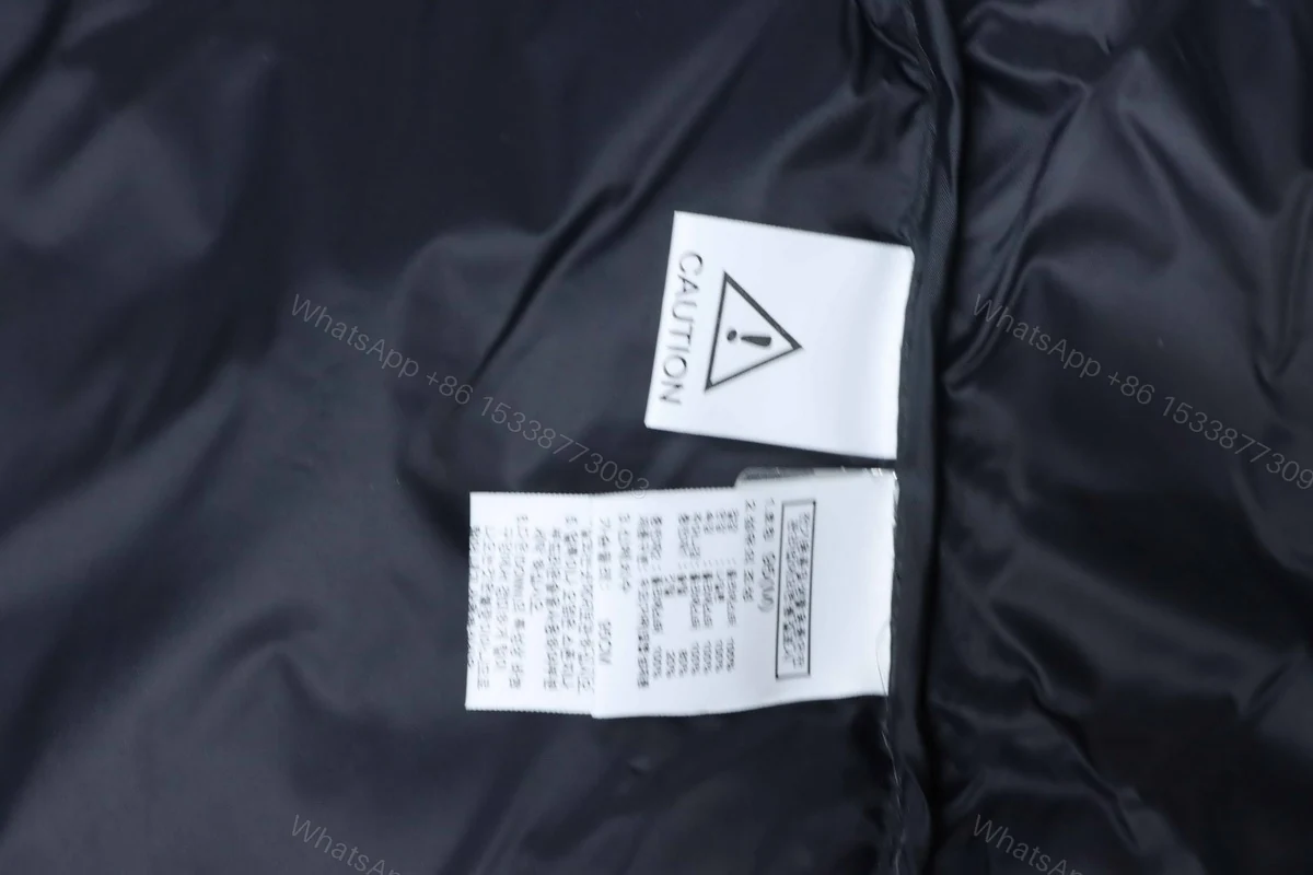 View 4 of TheNorthFace Large checkered down jacket 'Blue Black'