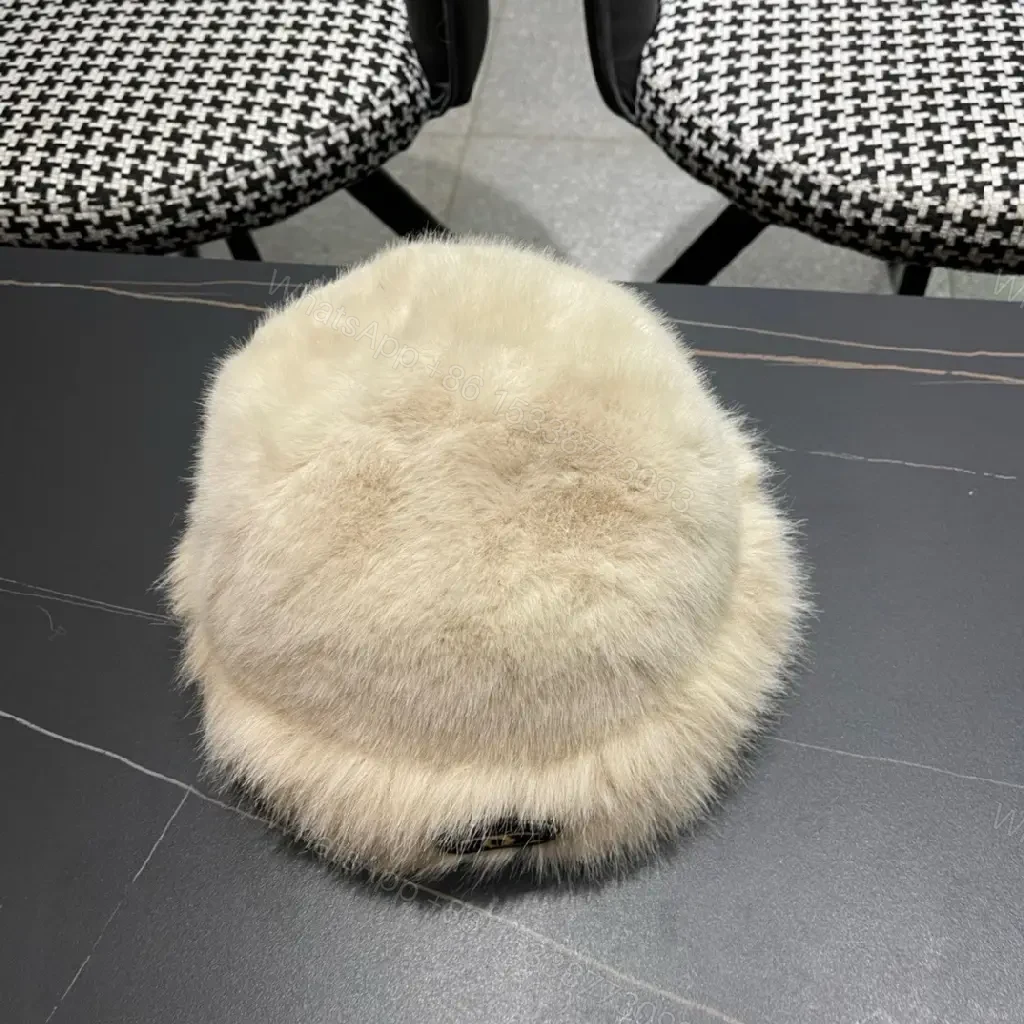 View 8 of Cream Faux Fur Pom Hat: Lux Soft Warmth, Subtle Logo Accent