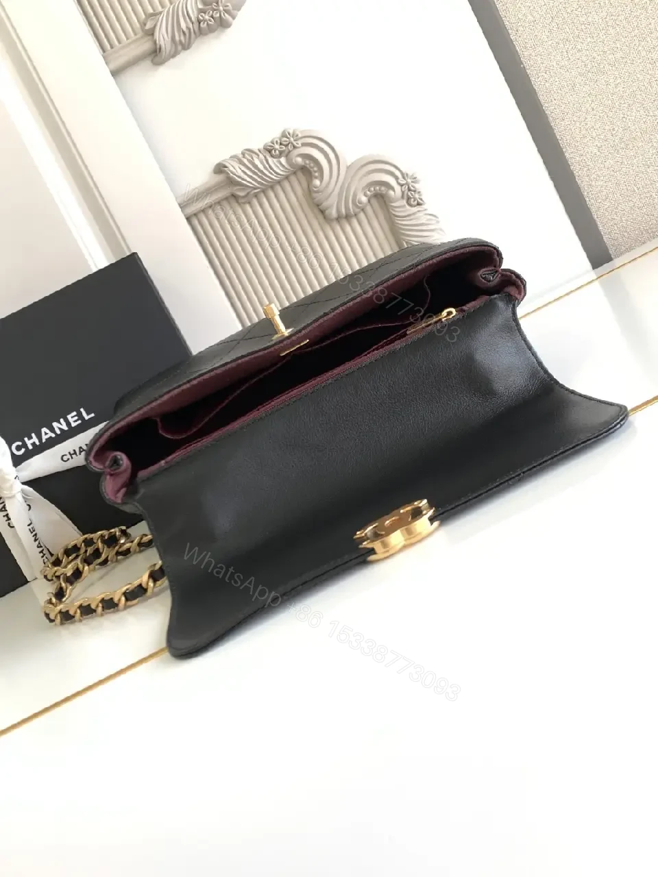 View 2 of Compact Quilted Black Leather Flap Bag with Chain Strap