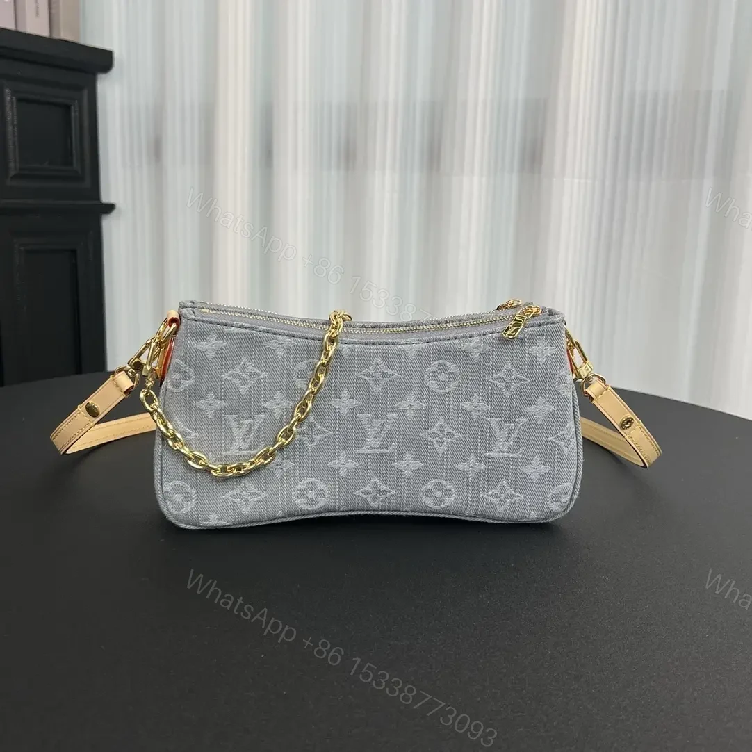 View 6 of Louis Vuitton Liv Pochette in Washed Denim