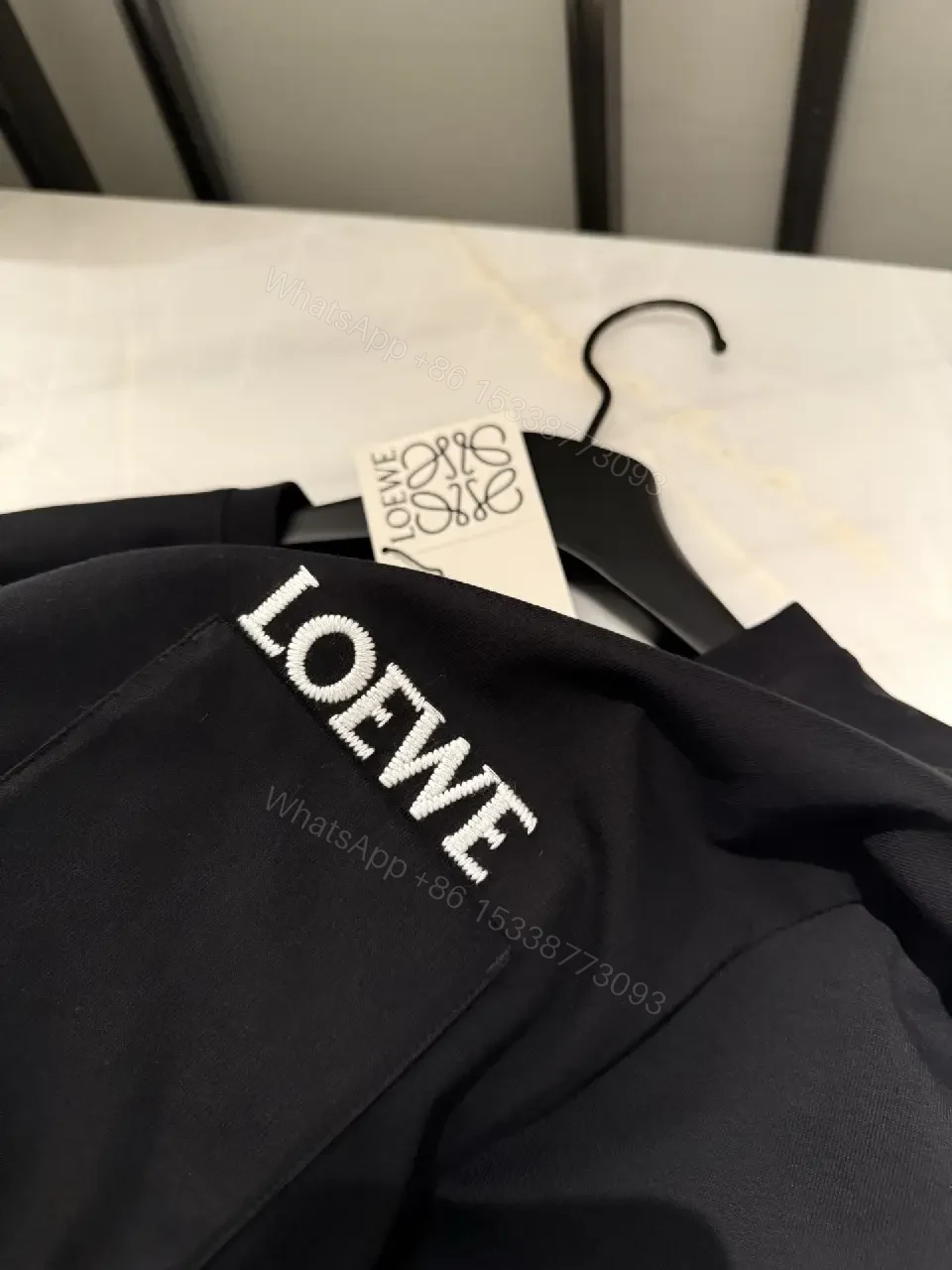 View 10 of Black Cotton Crew Tee with Pocket – Subtle Luxe Comfort