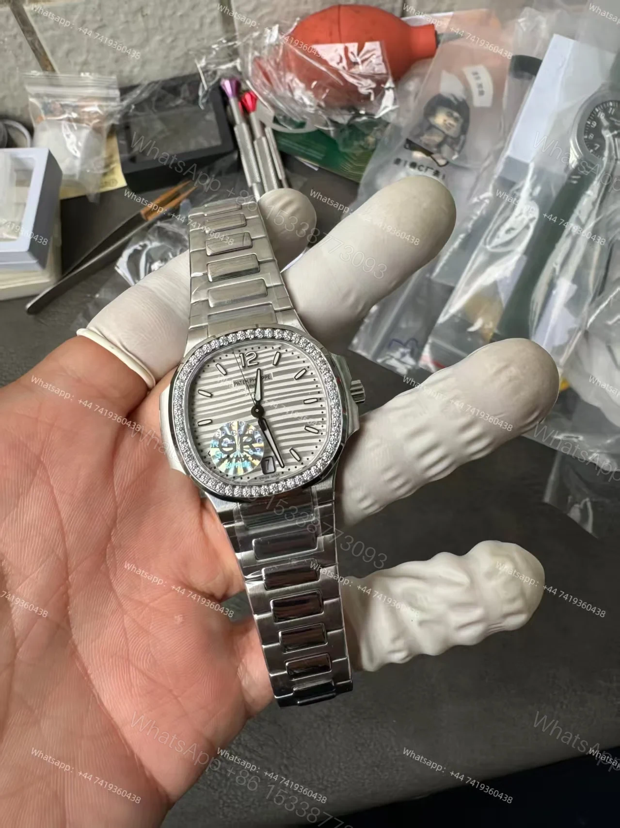 View 3 of Patek Philippe Super Clone Nautilus 7118/1200A-010 White Dial Diamond Bezel 35.2mm