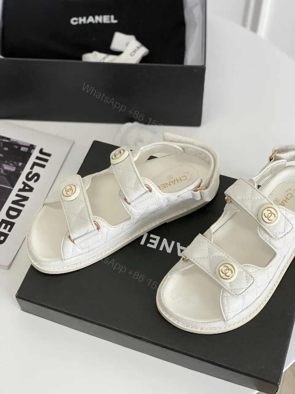 View 9 of White Quilted Sandals with Gold Emblem – Luxe Comfort Sandals