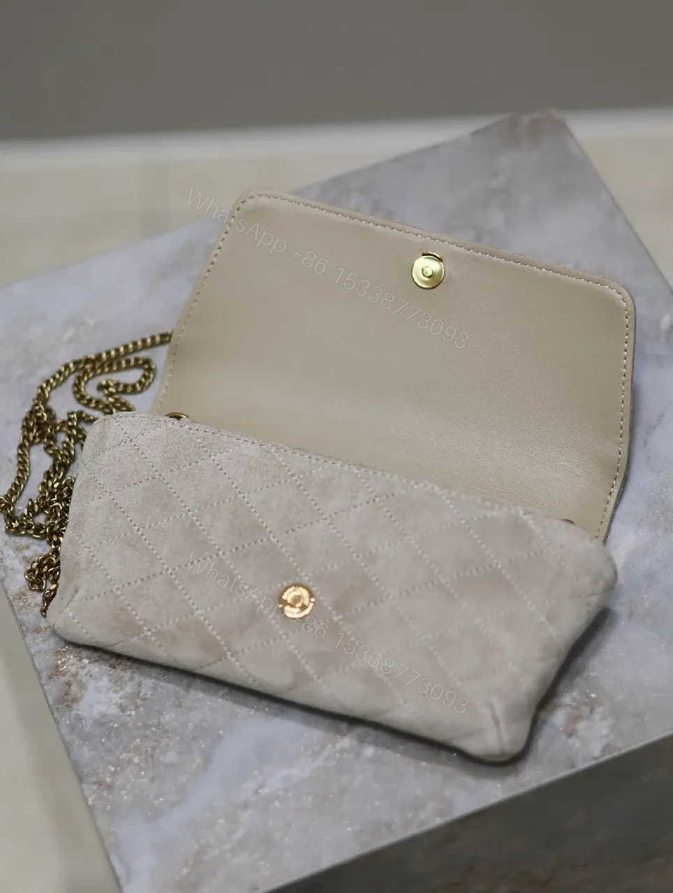 View 9 of Quilted Suede Clutch with Gold Logo Hardware - Classic Chic Clutch