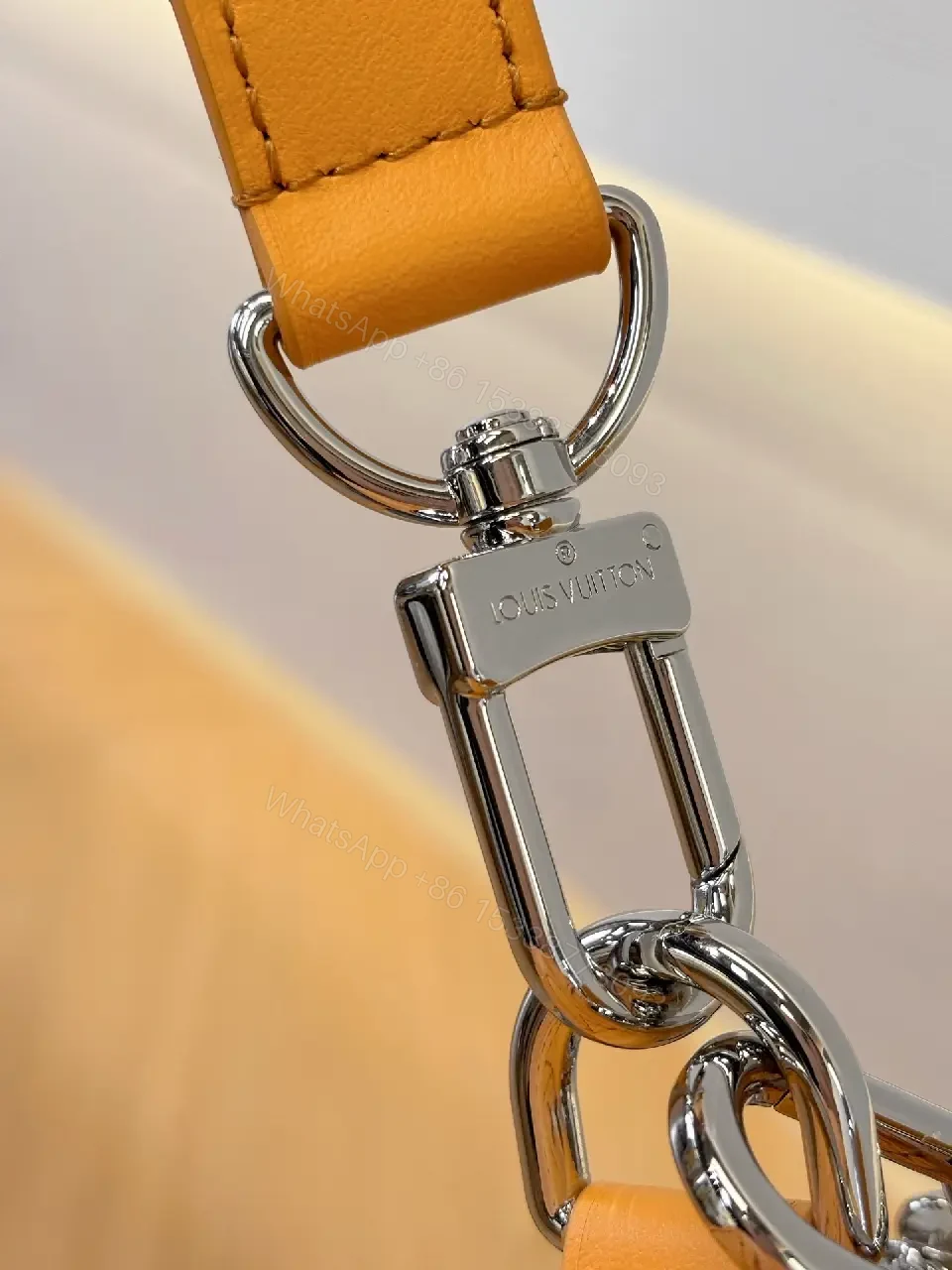 View 5 of Caramel Canvas Crossbody: Textured Monogram, Compact Chic