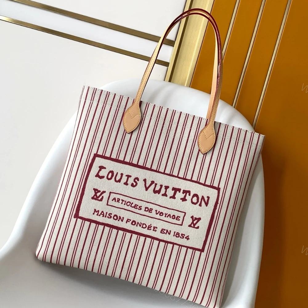 View 2 of LOUIS VUITTON CARRY IT BEIGE 37CM M15121