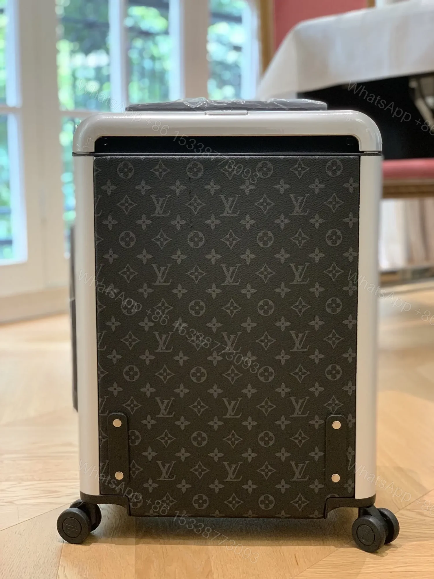 View 7 of Louis Vuitton Horizon 55 Monogram Eclipse canvas