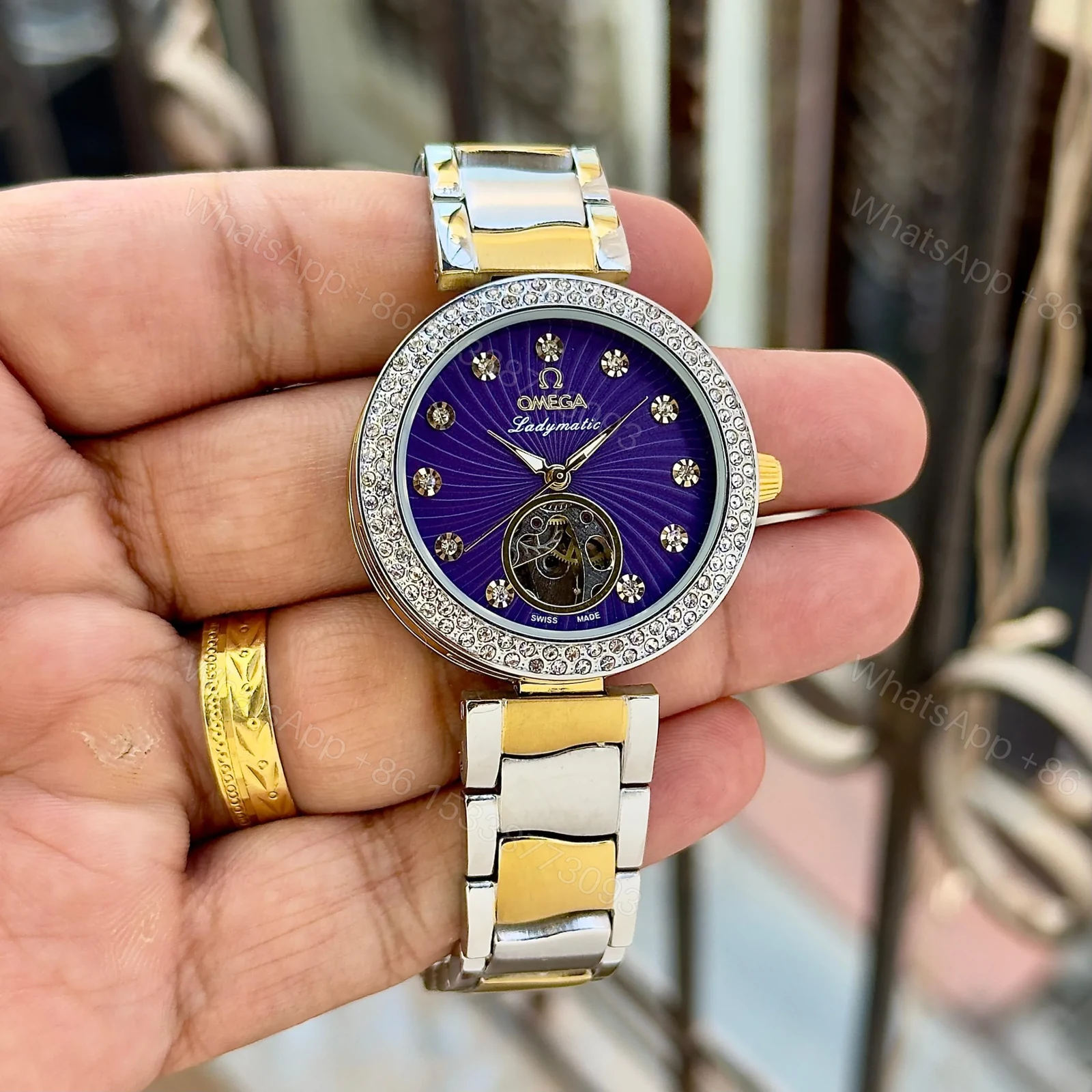 View 2 of Omega Ladymatic Purple Sunburst Dial