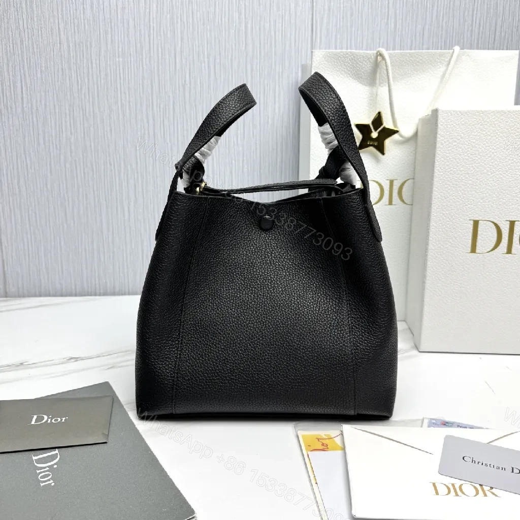 View 4 of Compact Black Pebbled Bucket Bag - Structured Luxury Everyday