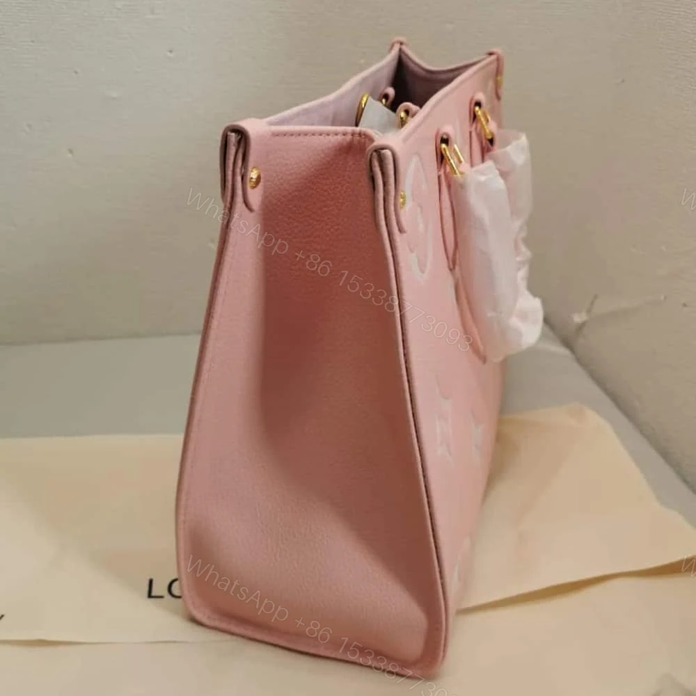 View 5 of Louis Vuitton Onthego MM Monogram Empreinte Leather Trianon Pink 33Cm M46286