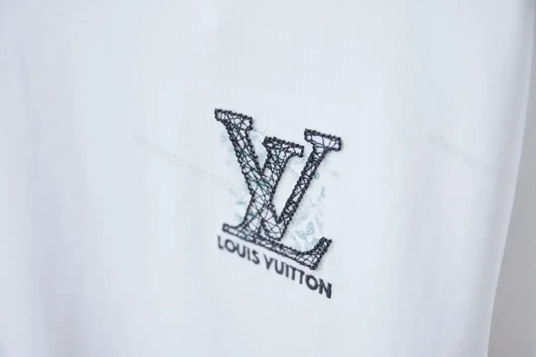 View 2 of Minimalist White Tee with LV Stitch – Premium Everyday Essential