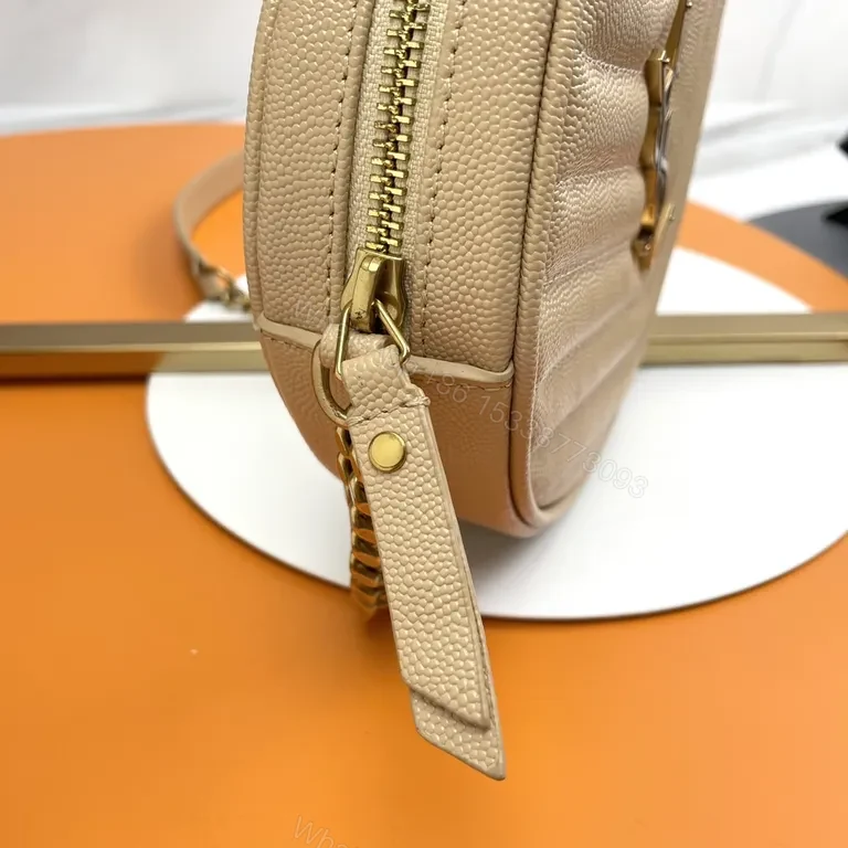 View 8 of Quilted Circular Crossbody Bag with Gold-YSL Emblem