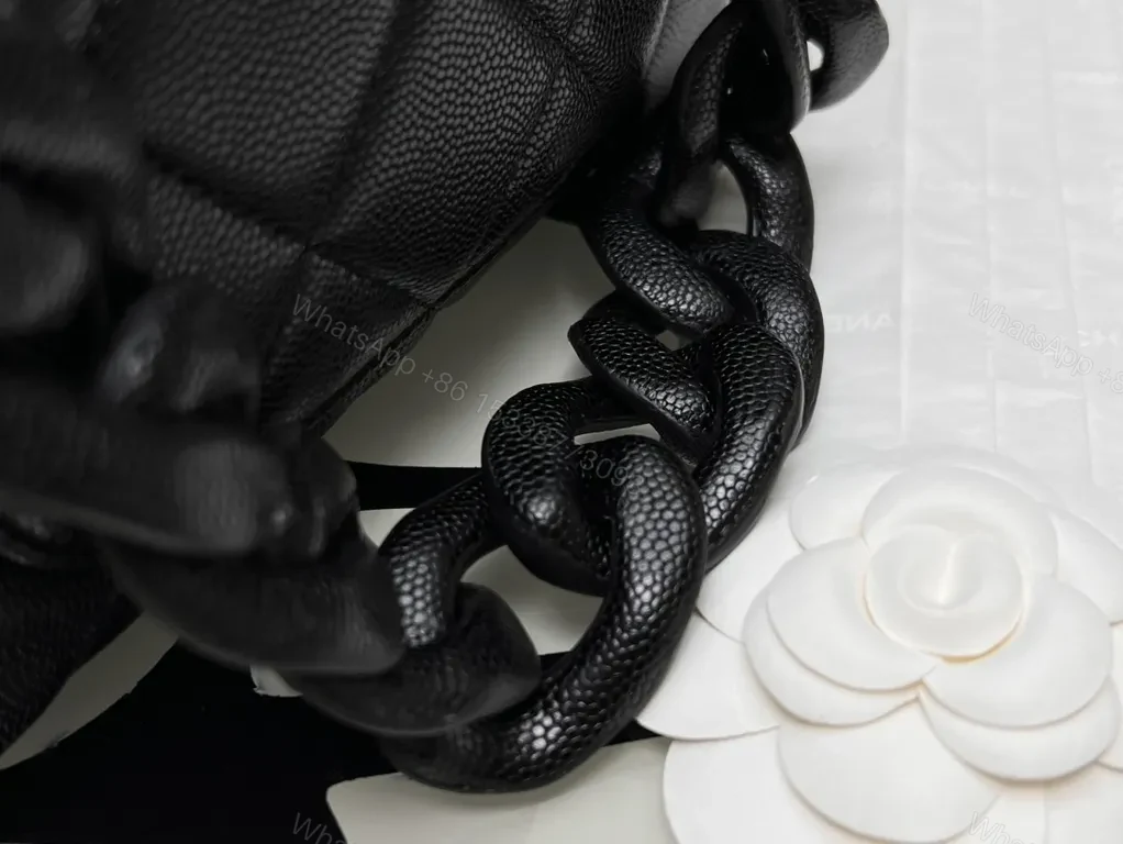 View 4 of Compact Quilted Black Flap Bag with Gold Hardware, Chain Carry