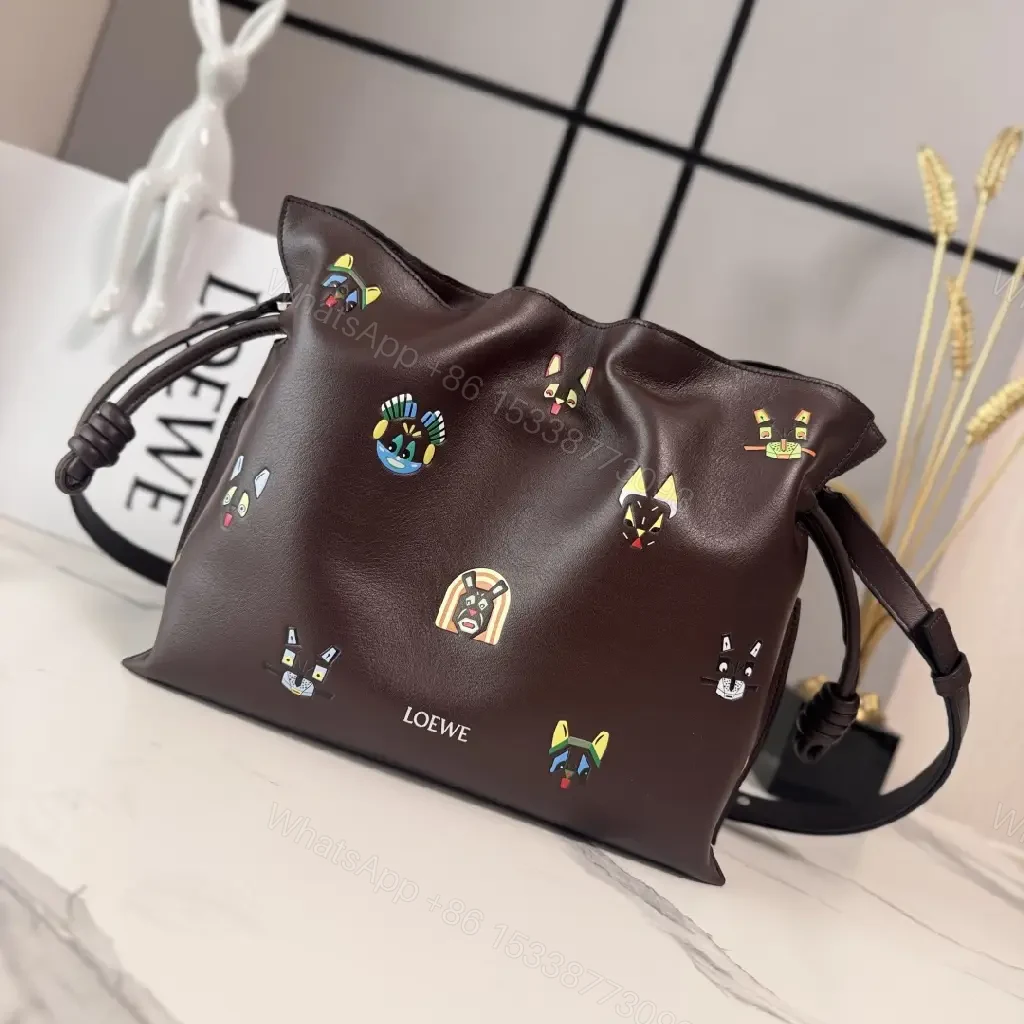 Dark Leather Crossbody: Playful Animal Motifs, Compact Chic — view 1