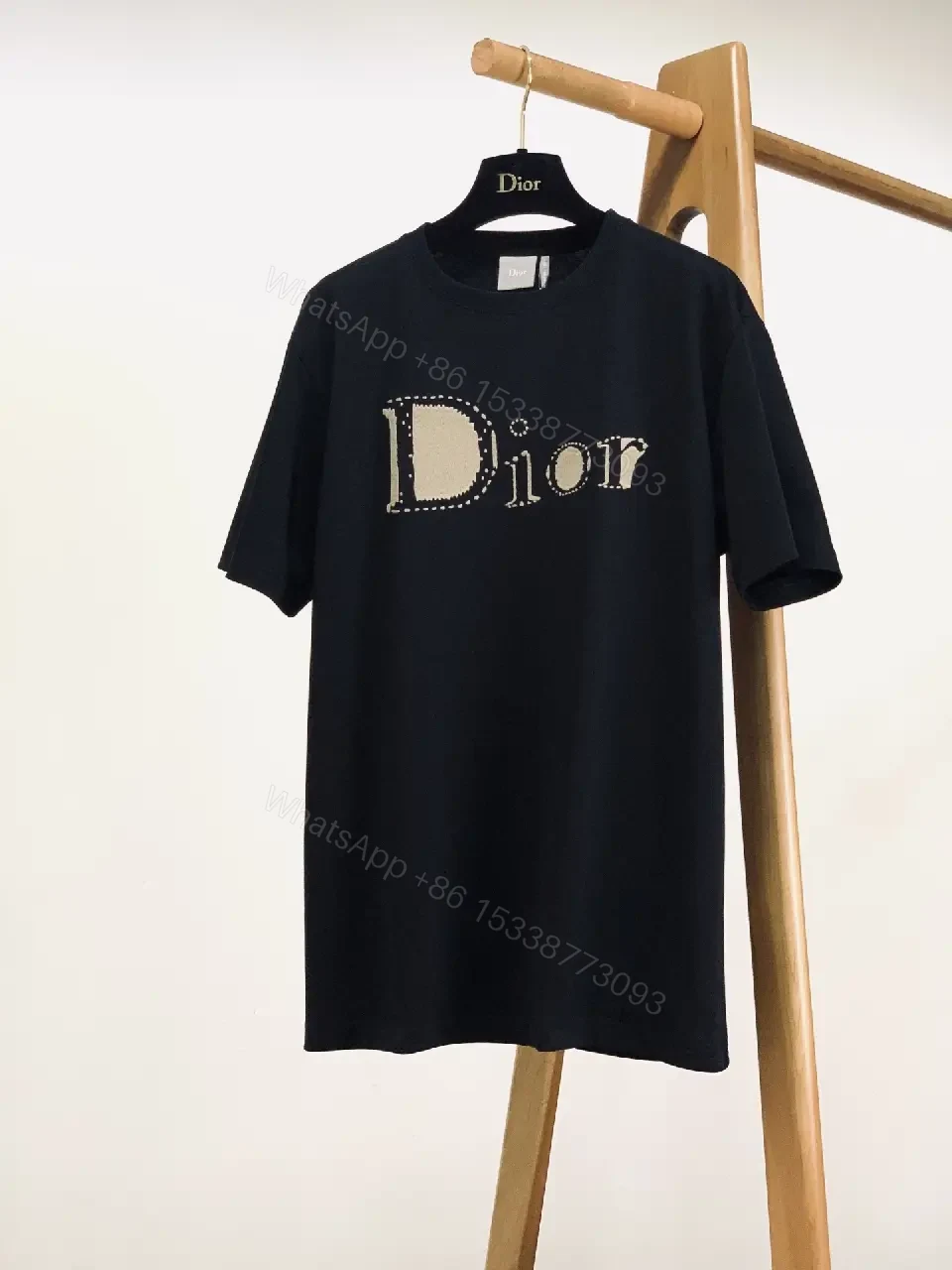 View 10 of Luminous Logo Tee: Black Cotton, Luxe Streetwear, Statement Tee