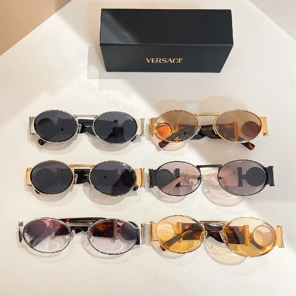 View 7 of Amber-Tinted Round Sunglasses: Gold-Accent, Sculpted Hardware, UV400 Shield