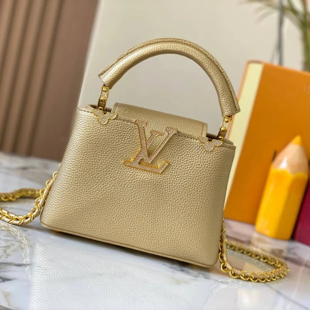 View 2 of Louis Vuitton Capucines Bag Gold 21Cm M24583