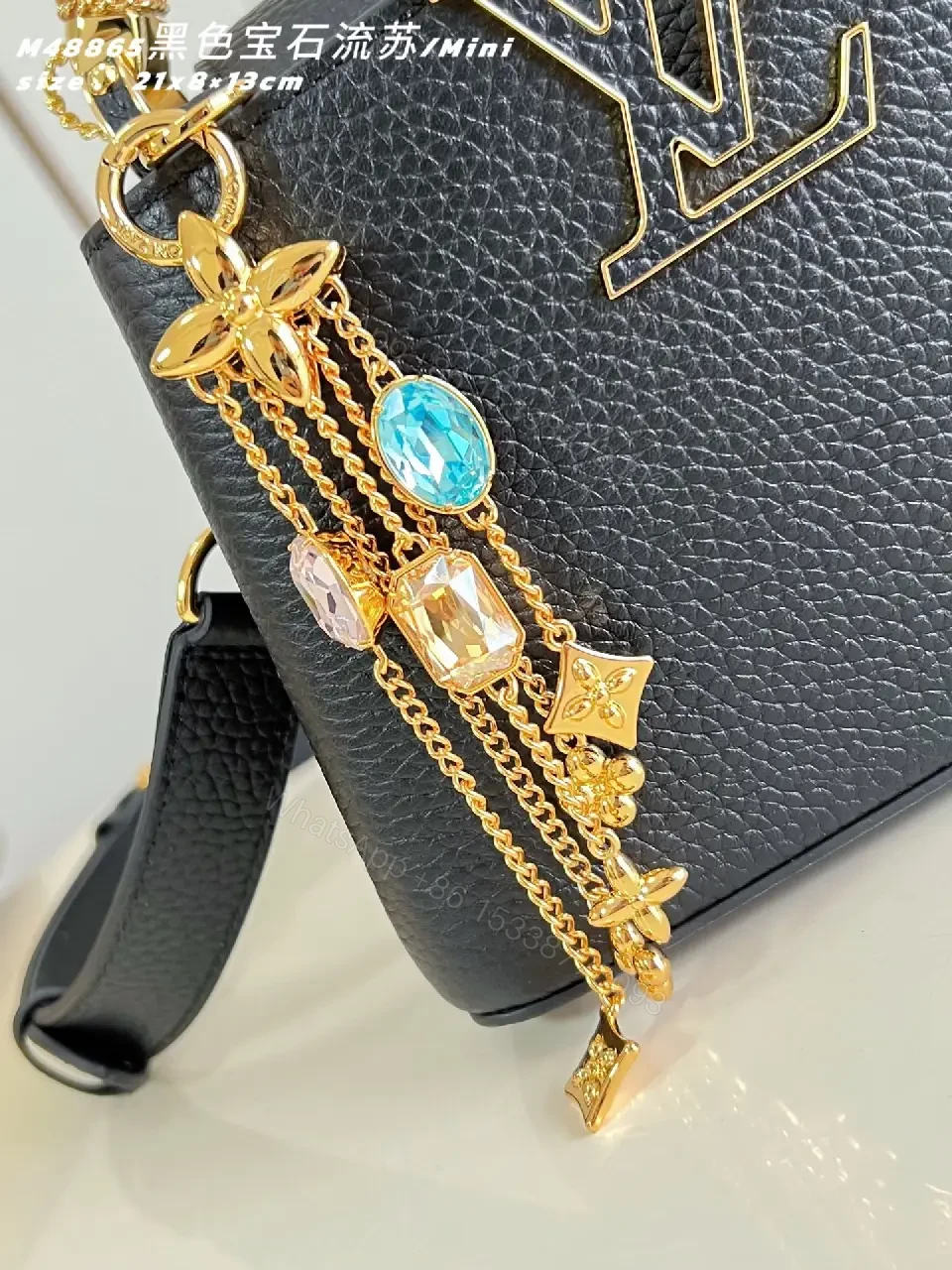 View 5 of Luxe Crossbody Bag: Gold-Accent Charm, Pebbled Leather, Compact Luxe