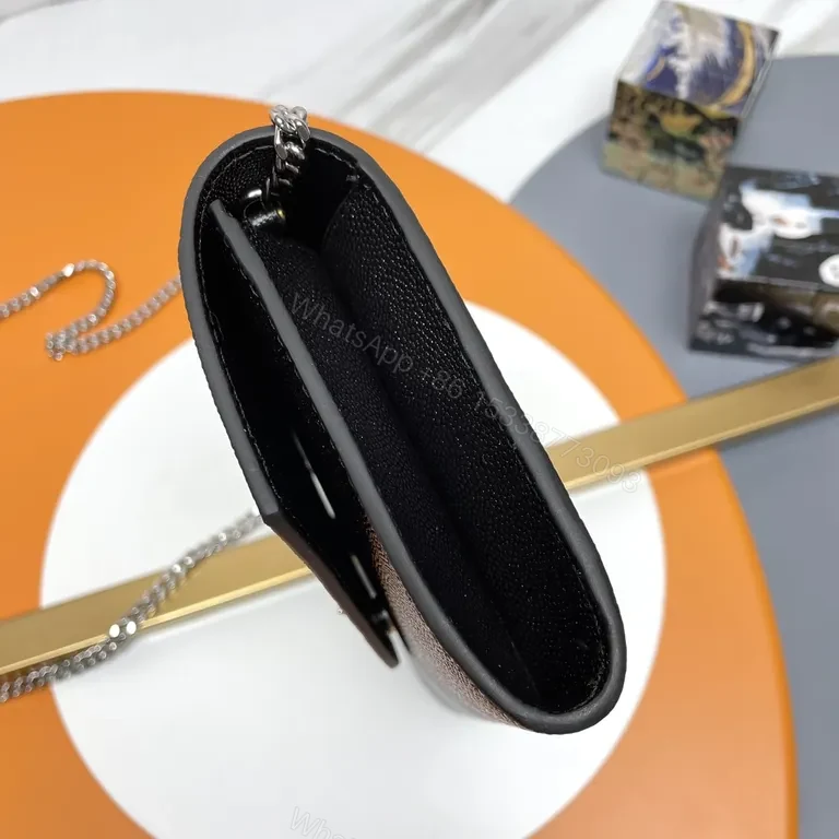 View 2 of Structured Black Leather Clutch with Chain Strap â€“ Day to Night