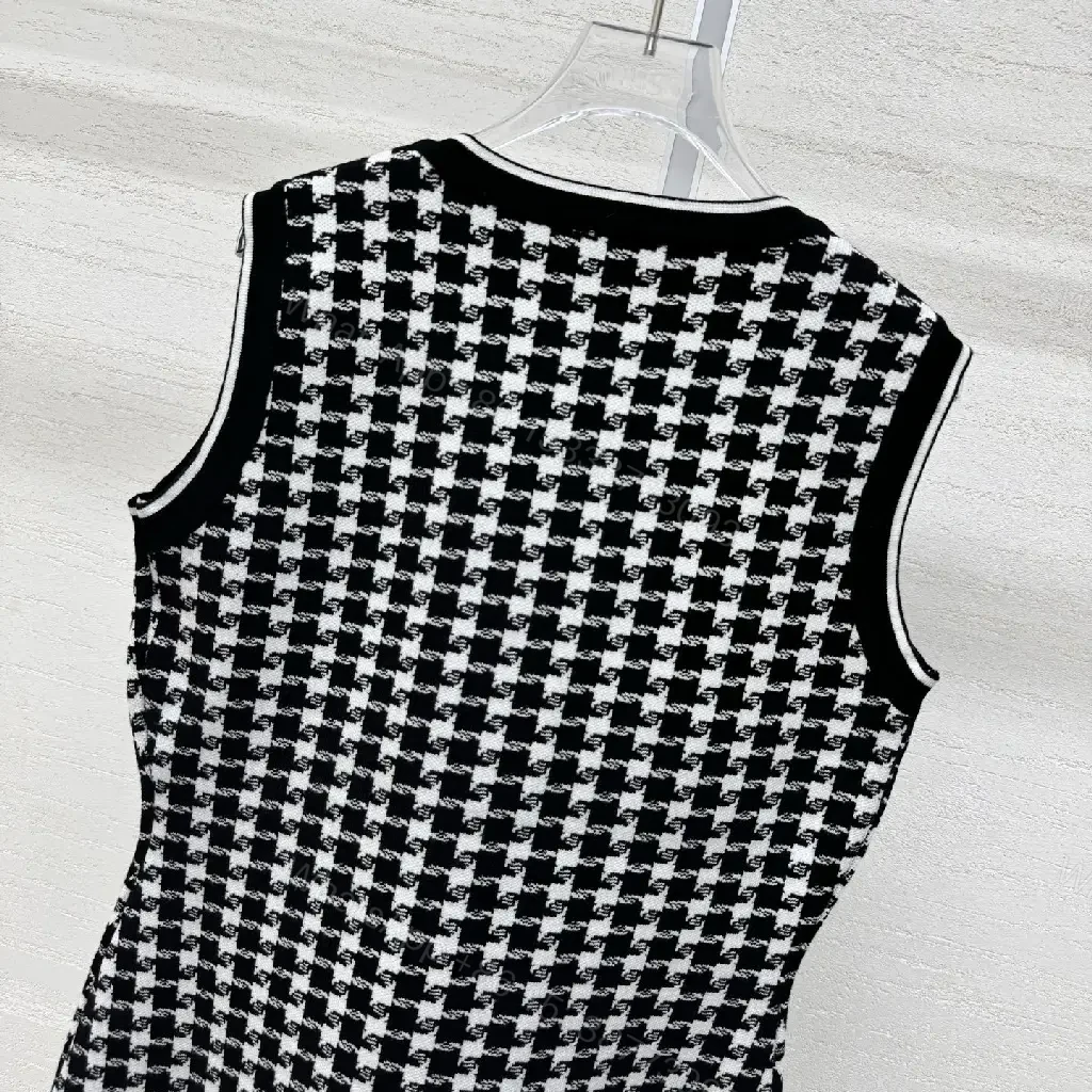 View 5 of Chic Textured Sleeveless Dress with Bold Houndstooth Pattern