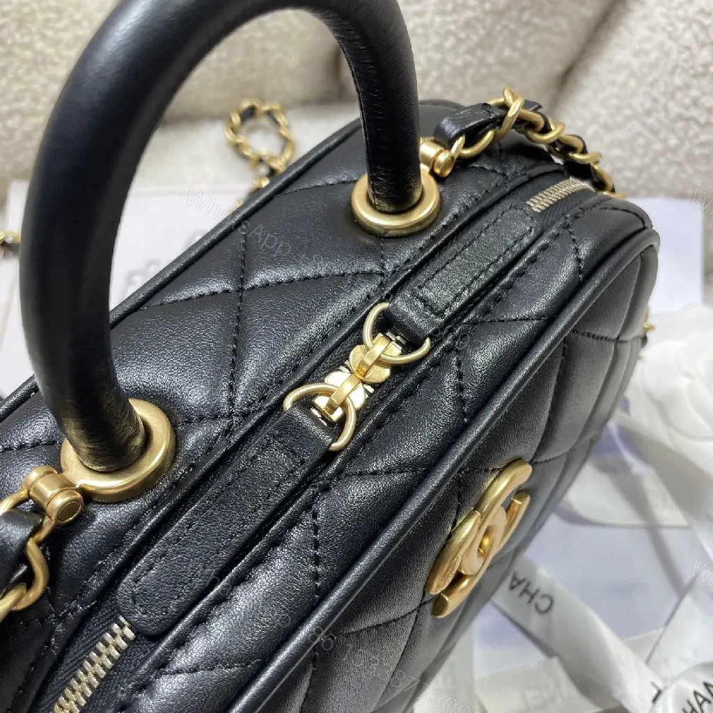 View 6 of Compact Black Quilted Handbag with Gold Logo Chain
