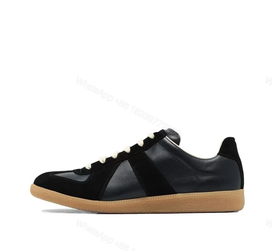 View 9 of Maison Margiela Replica low-top leather sneakers Black S57WS0236P1895
