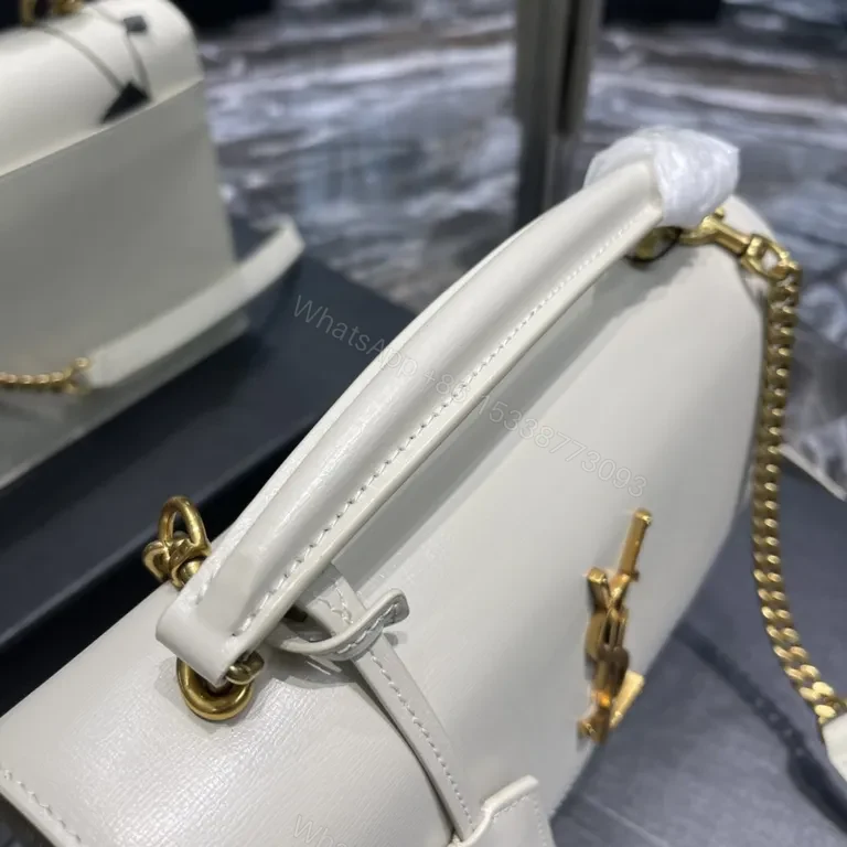 View 4 of Structured Leather Crossbody: White & Gold, YSL Emblem, Compact Luxury Bag
